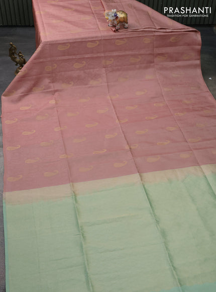 Kanchipuram silk saree pastel peach and pastel green with allover self emboss & zari buttas in borderless style