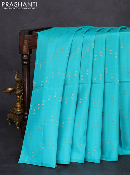 Kanchipuram silk saree teal blue and peach pink with allover zari woven zig zag weaves in borderless style