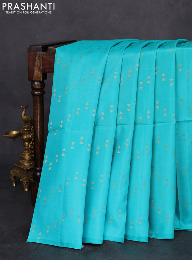 Kanchipuram silk saree teal blue and peach pink with allover zari woven zig zag weaves in borderless style