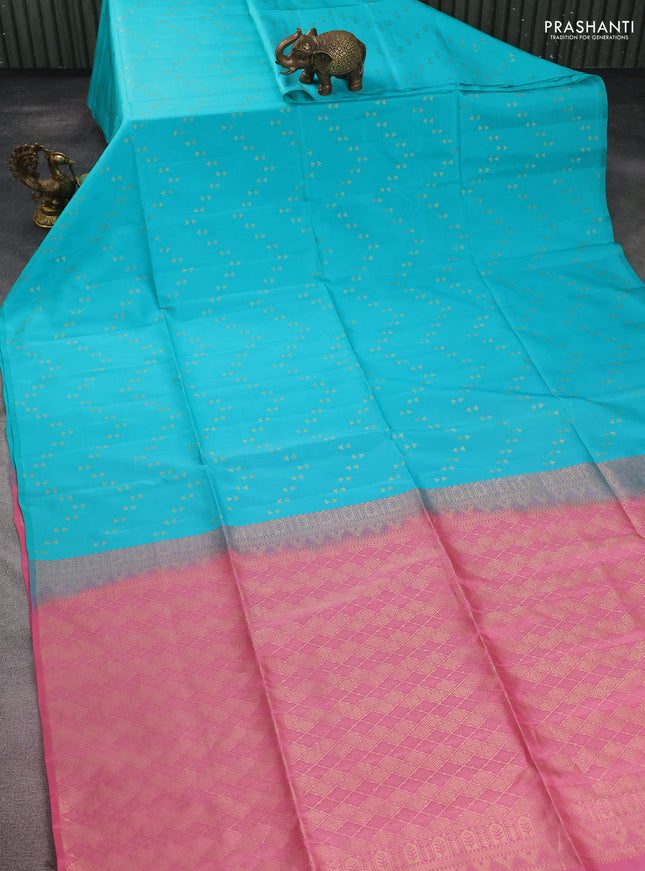 Kanchipuram silk saree teal blue and peach pink with allover zari woven zig zag weaves in borderless style