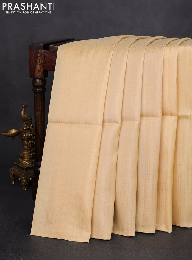 Kanchipuram silk saree cream and red with allover zari weaves in borderless style