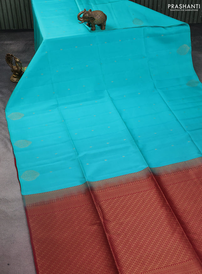 Kanchipuram silk saree teal blue and maroon with zari woven buttas in borderless style
