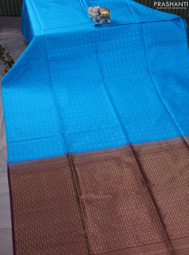 Kanchipuram silk saree cs blue and wine shade with allover self emboss in borderless style