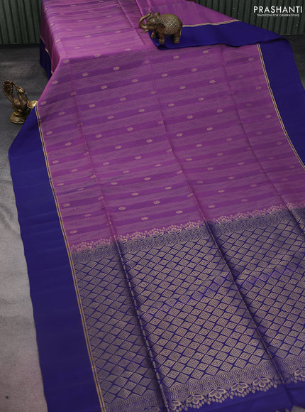 Kanchipuram silk saree purple and blue with allover zari weaves and zari woven simple border