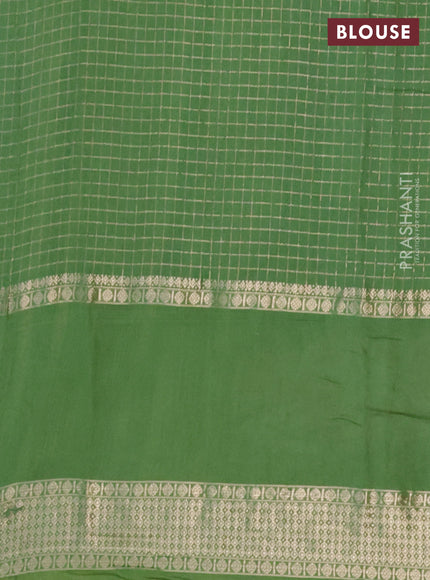 Semi chanderi saree light green with allover zari checked pattern and floral embroidery border