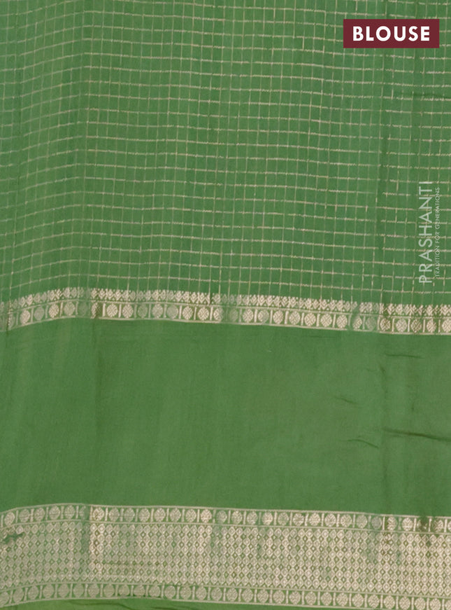 Semi chanderi saree light green with allover zari checked pattern and floral embroidery border