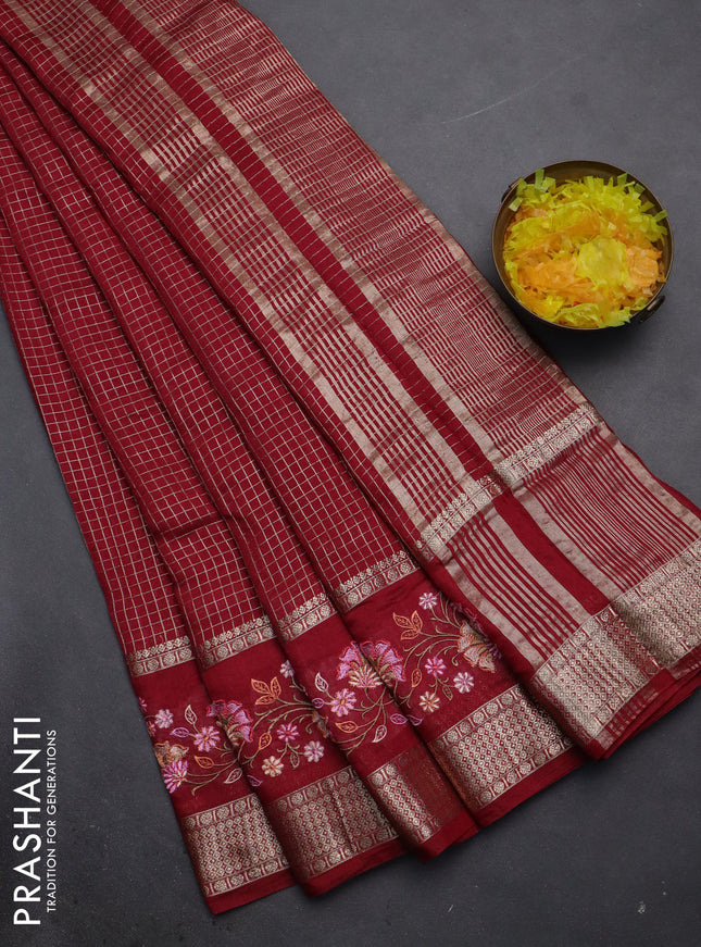Semi chanderi saree maroon with allover zari checked pattern and floral embroidery border