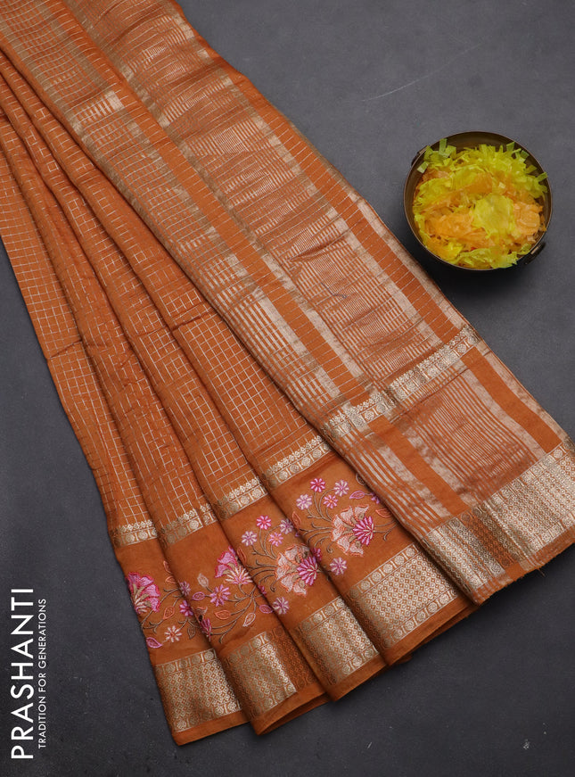 Semi chanderi saree orange with allover zari checked pattern and floral embroidery border