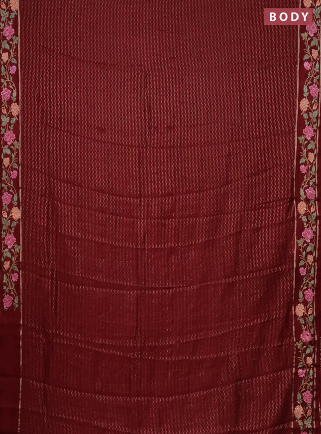 Semi chanderi saree maroon with allover zari weaves and floral embroidery border