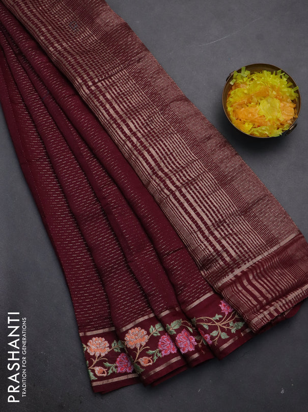 Semi chanderi saree wine shade with allover zari weaves and floral embroidery border