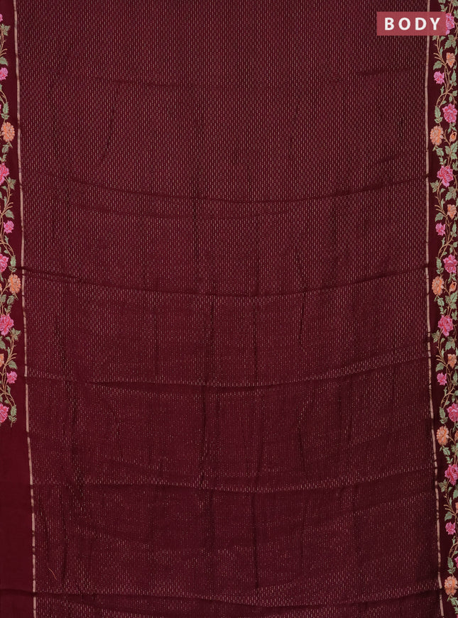 Semi chanderi saree wine shade with allover zari weaves and floral embroidery border