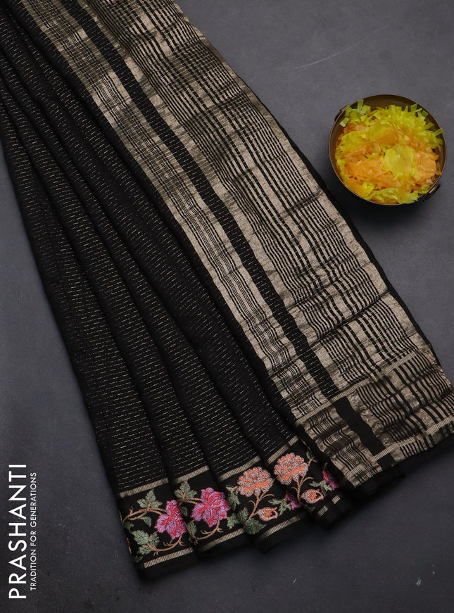 Semi chanderi saree black with allover zari weaves and floral embroidery border