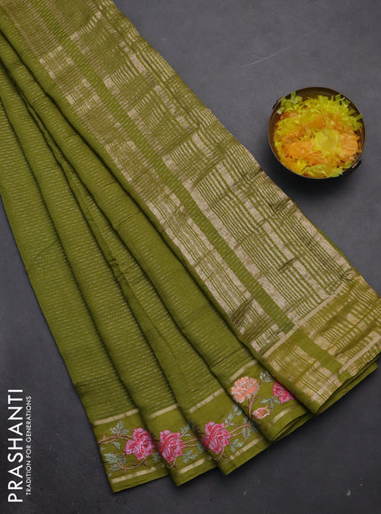 Semi chanderi saree mehendi green with allover zari weaves and floral embroidery border