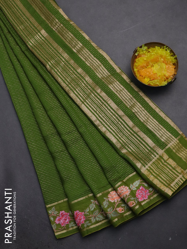 Semi chanderi saree light green with allover zari weaves and floral embroidery border