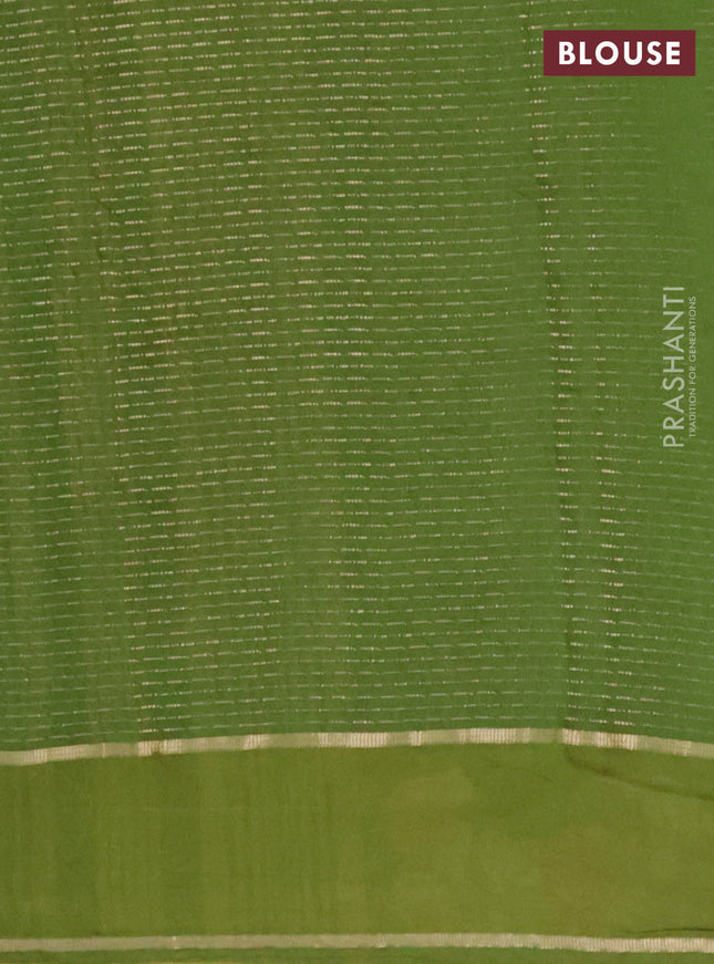 Semi chanderi saree light green with allover zari weaves and floral embroidery border