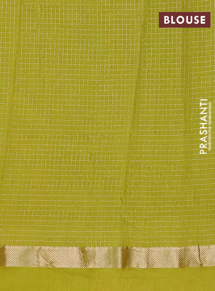 Semi chanderi saree light green with allover zari checked pattern and embroidery border
