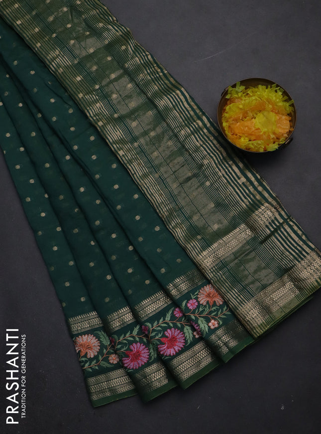 Semi chanderi saree green shade with zari woven buttas and floral embroidery border