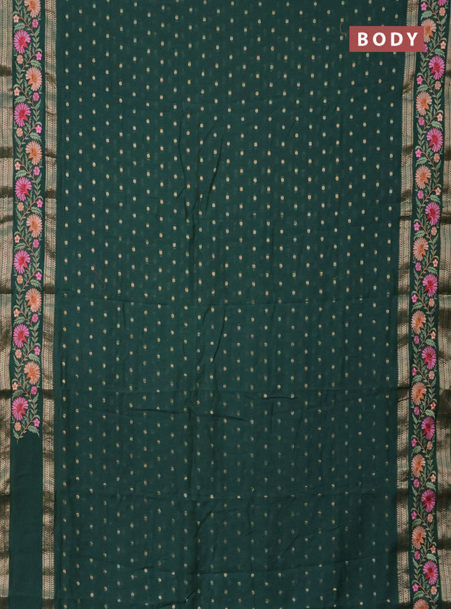 Semi chanderi saree green shade with zari woven buttas and floral embroidery border