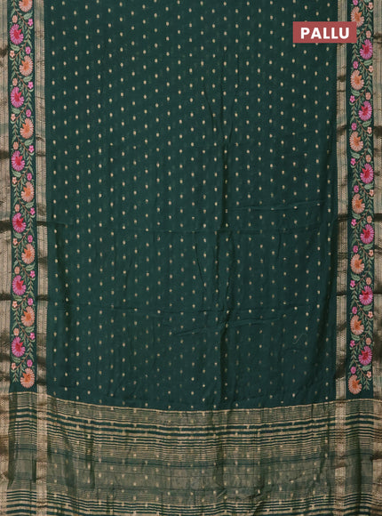 Semi chanderi saree green shade with zari woven buttas and floral embroidery border
