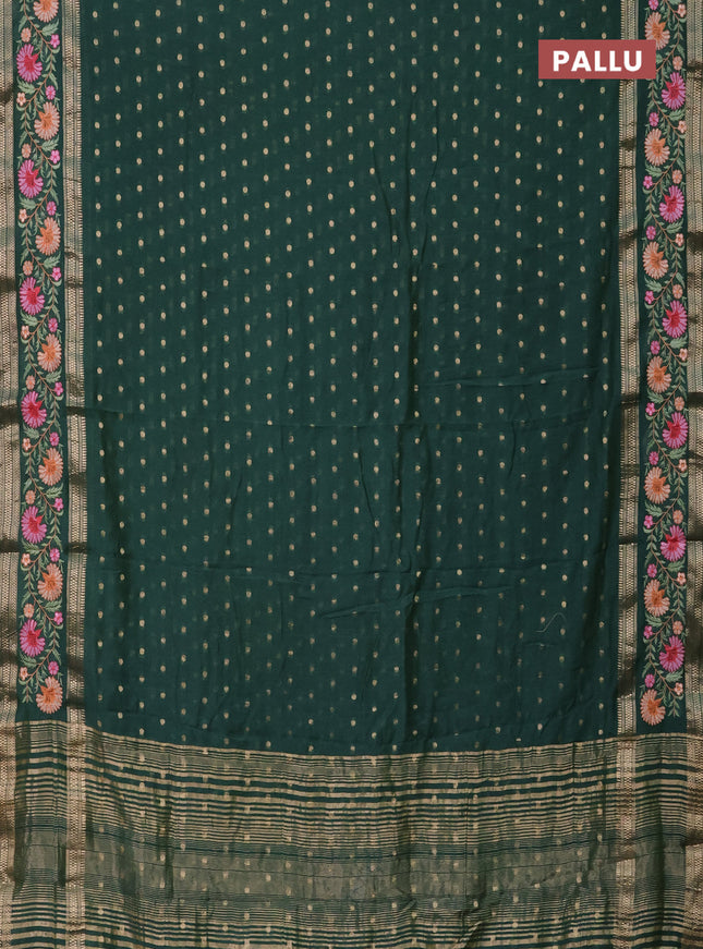 Semi chanderi saree green shade with zari woven buttas and floral embroidery border