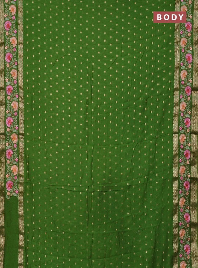 Semi chanderi saree light green with zari woven buttas and floral embroidery border