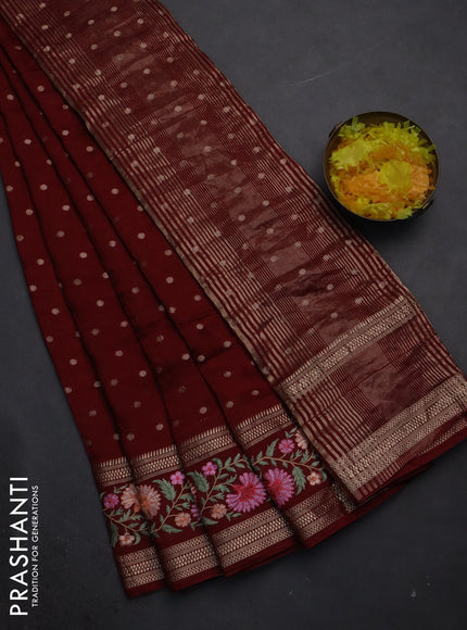 Semi chanderi saree maroon with zari woven buttas and floral embroidery border