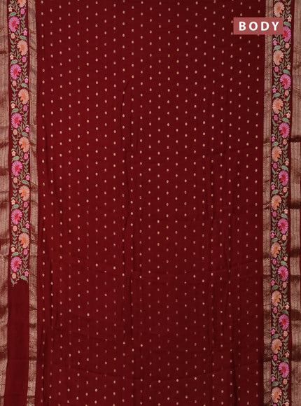 Semi chanderi saree maroon with zari woven buttas and floral embroidery border