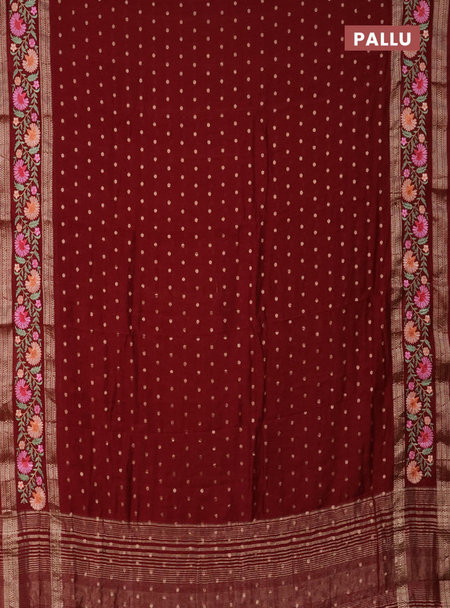Semi chanderi saree maroon with zari woven buttas and floral embroidery border