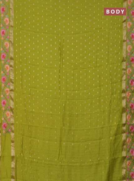 Semi chanderi saree light green with zari woven buttas and floral embroidery border