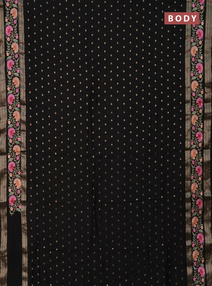 Semi chanderi saree black with zari woven buttas and floral embroidery border