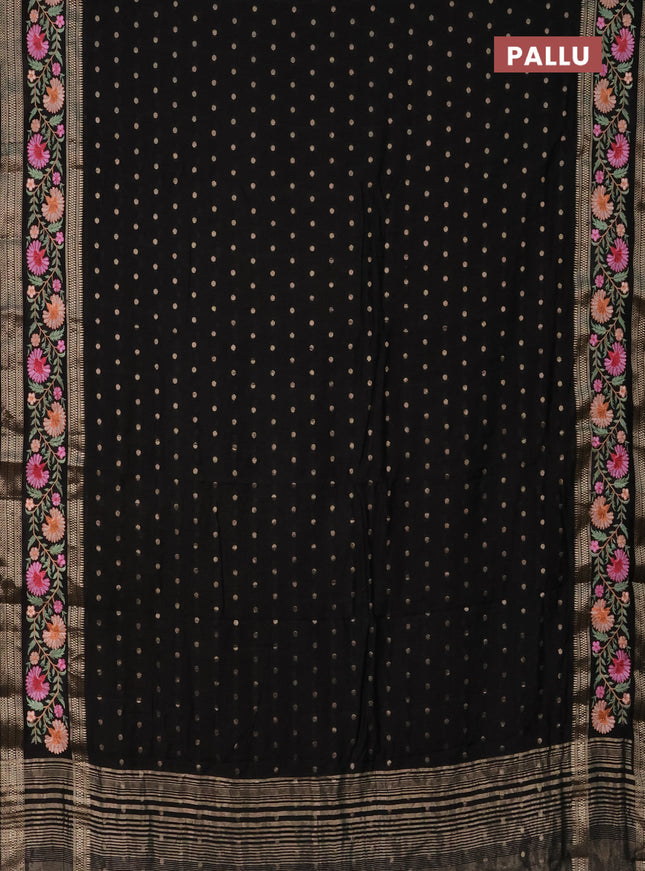 Semi chanderi saree black with zari woven buttas and floral embroidery border