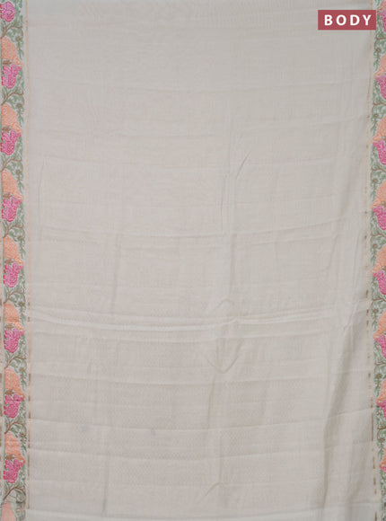 Semi chanderi saree off white with allover zari weaves and floral embroidery border