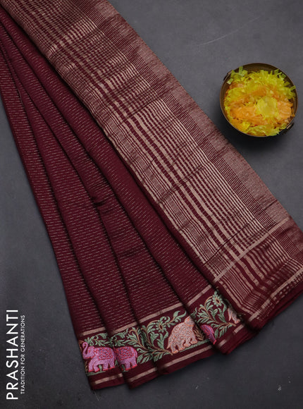 Semi chanderi saree deep maroon with allover zari weaves and floral embroidery border