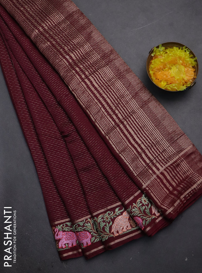 Semi chanderi saree deep maroon with allover zari weaves and floral embroidery border