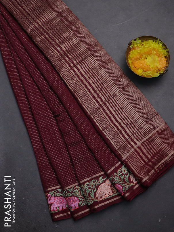 Semi chanderi saree deep maroon with allover zari weaves and floral embroidery border