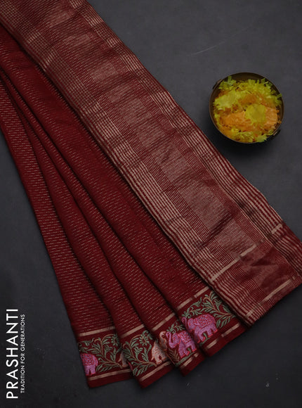 Semi chanderi saree maroon with allover zari weaves and floral embroidery border