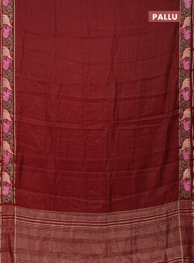 Semi chanderi saree maroon with allover zari weaves and floral embroidery border