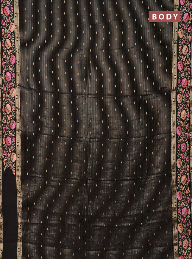 Semi chanderi saree black with allover zari weaves & buttas and floral embroidery border