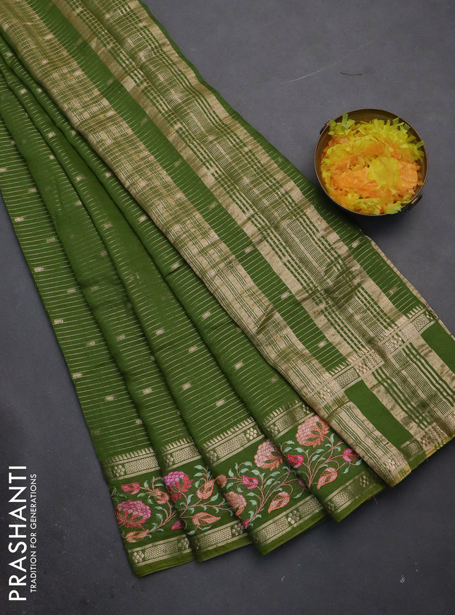 Semi chanderi saree green with allover zari weaves & buttas and floral embroidery border