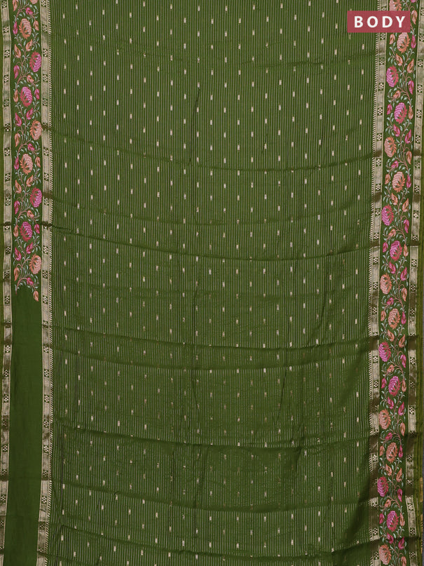 Semi chanderi saree green with allover zari weaves & buttas and floral embroidery border