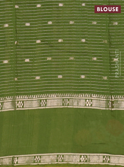 Semi chanderi saree green with allover zari weaves & buttas and floral embroidery border