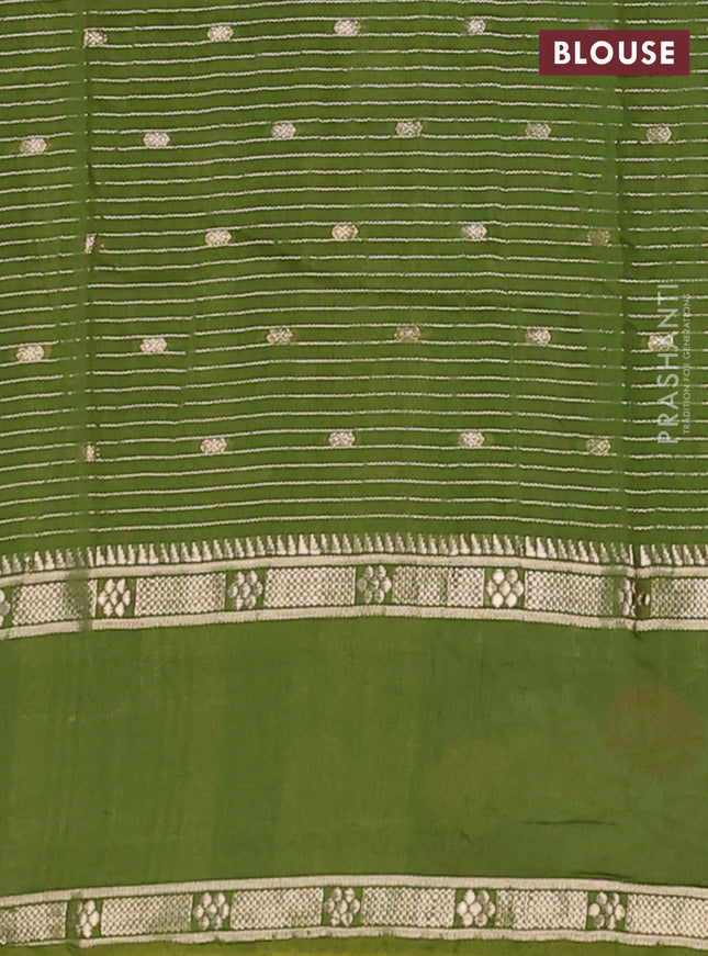 Semi chanderi saree green with allover zari weaves & buttas and floral embroidery border