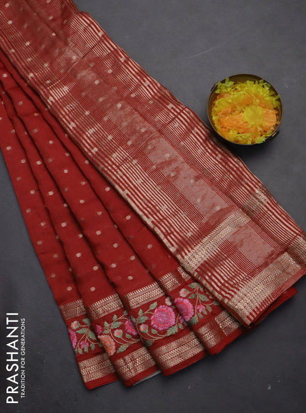 Semi chanderi saree rust shade with zari woven buttas and floral embroidery border