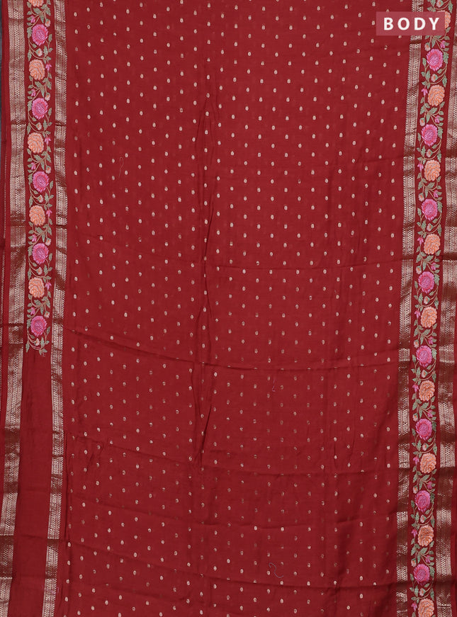 Semi chanderi saree rust shade with zari woven buttas and floral embroidery border