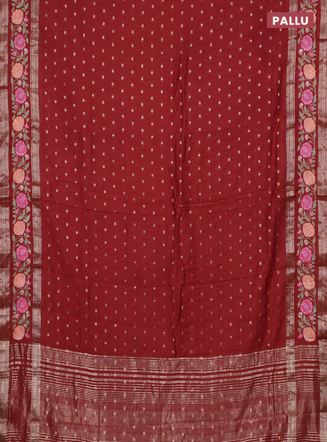 Semi chanderi saree rust shade with zari woven buttas and floral embroidery border