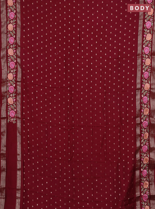Semi chanderi saree maroon with zari woven buttas and floral embroidery border