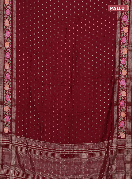 Semi chanderi saree maroon with zari woven buttas and floral embroidery border