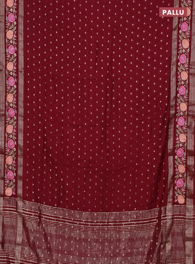 Semi chanderi saree maroon with zari woven buttas and floral embroidery border