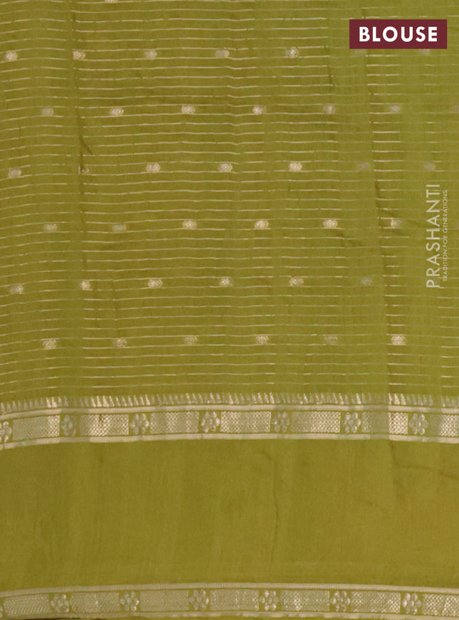 Semi chanderi saree mehendi green with allover zari weaves & buttas and embroidery border