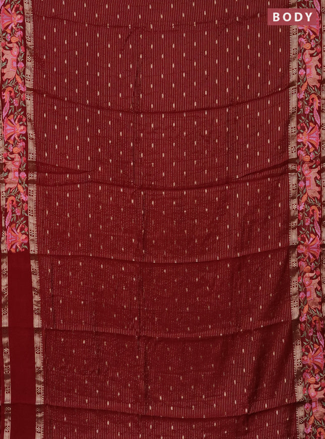 Semi chanderi saree maroon with allover zari weaves & buttas and embroidery border